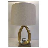 PAIR OF BRUSHED ANTIQUE GOLD OVAL BASE LAMPS WITH OATMEAL COLORED SHADES PAIR OF BRUSHED ANTIQUE GOLD OVAL BASE LAMPS WITH OATMEAL COLORED SHADES