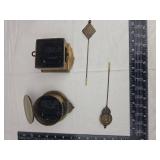 Mid-Century Brass Wall Clock Pendulums Mid-Century Brass Wall Clock Pendulums