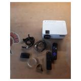 VANKYO Leisure 470 HD Mini Projector with Roku Express Streaming Player  50000 Hrs LED Life  240   Display Screen for Home Theater & Outdoor Movies - Retail: $125