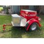 Coca-Cola trailer with ice chest storage and umbrella