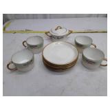 Vintage Rose Pattern Tea Set with Gold Trim, one cup chipped, see pictures.