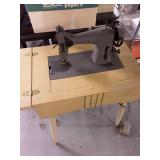 Vintage Kenmore Sewing Machine with Cabinet, does not power on.