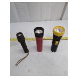 Lot of 3 Handheld Flashlights - Black, Red, and Yellow/Black