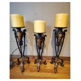 METAL CANDLE PILLARS WITH YELLOW CANDLES METAL CANDLE PILLARS WITH YELLOW CANDLES
