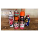 FULL TO HALF FULL GARAGE ASSORTMENT OF SPRAY CAN ITEMS AND ADHESIVE FULL TO HALF FULL GARAGE ASSORTMENT OF SPRAY CAN ITEMS AND ADHESIVE