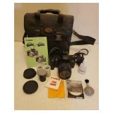 CANON EOS Rebel XS Camera with Manual, Accessories, 3 Rolls of 400 Color Film & Case, Large Adjustable Camera Tripod, and Targus Camera Tripod in Case