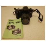 CANON EOS Rebel XS Camera with Manual, Accessories, 3 Rolls of 400 Color Film & Case, Large Adjustable Camera Tripod, and Targus Camera Tripod in Case