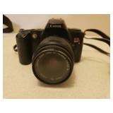 CANON EOS Rebel XS Camera with Manual, Accessories, 3 Rolls of 400 Color Film & Case, Large Adjustable Camera Tripod, and Targus Camera Tripod in Case