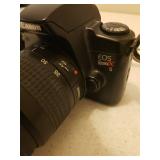 CANON EOS Rebel XS Camera with Manual, Accessories, 3 Rolls of 400 Color Film & Case, Large Adjustable Camera Tripod, and Targus Camera Tripod in Case