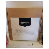 Home Office Supplies, Kleenex Travel Packs, and Bottle of Women