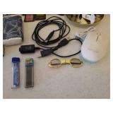 Home Office Supplies, Kleenex Travel Packs, and Bottle of Women