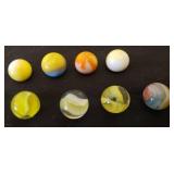 Collection of 8 Antique Yellow Tone Small Size Glass Marbles