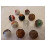Collection of 11 Antique Brown/Multi Tone Small Size Glass Marbles
