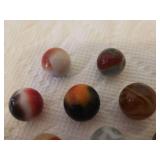 Collection of 11 Antique Brown/Multi Tone Small Size Glass Marbles
