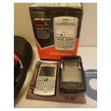 WARP Headphones in Case, Motorola Slider Phone, and BlackBerry 8830