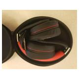 WARP Headphones in Case, Motorola Slider Phone, and BlackBerry 8830