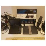 Philips Portable DVD Player, Motorola SURFboard, LINKSYS AC1200+ Router, and various Cables & Power Cords