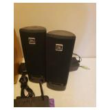 Toshiba DVD Player SD-4100, D-Link, Pair of JBL Speakers, Jawbone Jambox, Remotes, Various Connection and Power Cords, and Collection of Popular Movie DVDs with Rack