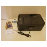 CANON MX490 Pixma Color Printer and Stack of Printer Paper