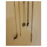 5 Statement Necklaces and Gold Metal Jewelry Storage Wall Rack