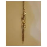 5 Statement Necklaces and Gold Metal Jewelry Storage Wall Rack