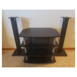 4 Shelf Media Component Stand and Surround Sound Speaker Stands - in Basement - Bring Help To Move!