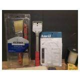 Painting Supplies: Brushes, Roller Covers, Scrapers/Putty Knives, Sanding Blocks, Tape, and Paint Stir Sticks