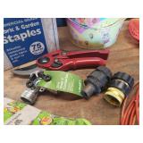 Gardening Gloves, Bulb Planter Tool, Sand Pail, Fly Swatters, Dog Leash Cord, Box of Garden Fabric Staples, Hand Pruners, and Hose Connecters