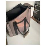 Arm sling phone carrier. W/ Air Tag carriers