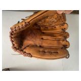 2 Leather baseball gloves