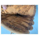 2 Leather baseball gloves