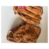 2 Leather baseball gloves