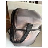 Arm sling phone carrier. W/ Air Tag carriers