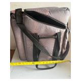 Arm sling phone carrier. W/ Air Tag carriers