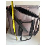 Arm sling phone carrier. W/ Air Tag carriers