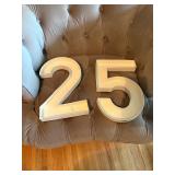 large cardboard "2 and 5"