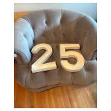 large cardboard "2 and 5"