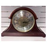 Traditional Wooden Mantel Clock with Ornate Face