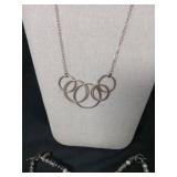 Modern Jewelry Set with Interlocking Circles Necklace and Beaded Bracelets