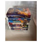 Vintage stack of VHS tapes, primarily Disney films.