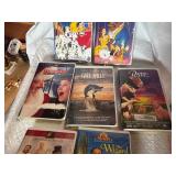 Vintage stack of VHS tapes, primarily Disney films.