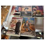 Vintage stack of VHS tapes, primarily Disney films.