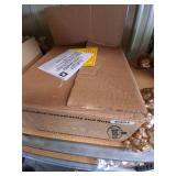 Box Full of Red Christmas Ornaments