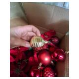 Box Full of Red Christmas Ornaments