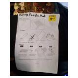 1000 Piece Puzzle With Blow up Roll Up Puzzle Mat.