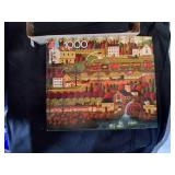 1000 Piece Puzzle With Blow up Roll Up Puzzle Mat.