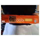 1000 Piece Puzzle With Blow up Roll Up Puzzle Mat.