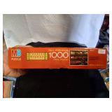 1000 Piece Puzzle With Blow up Roll Up Puzzle Mat.