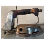 Antique charcoal “sad” iron with detachable handle + antique cast iron curling iron with wood grip