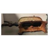 Antique charcoal “sad” iron with detachable handle + antique cast iron curling iron with wood grip